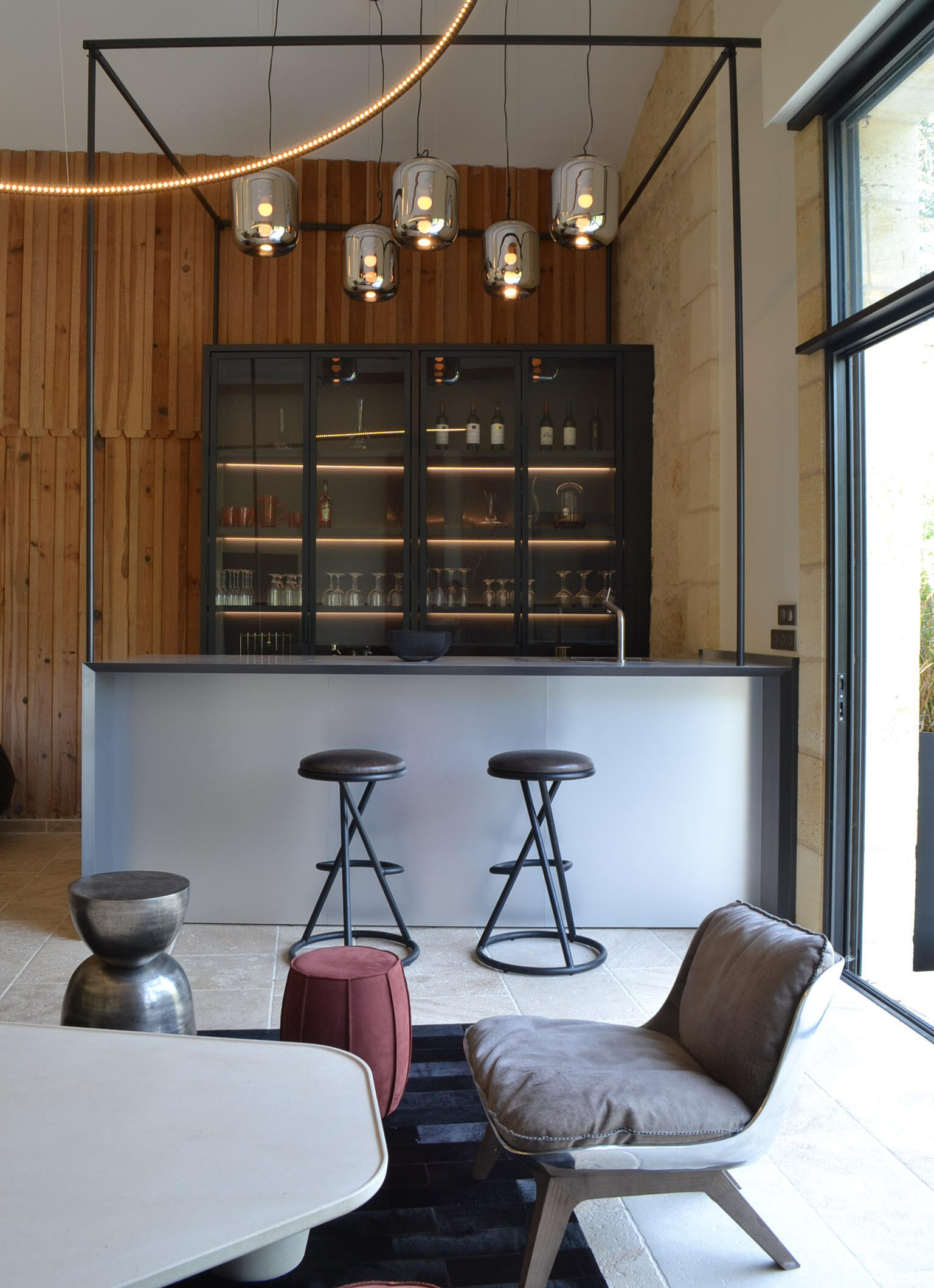 Custom Bar Design Minimalist custom-designed bar integrating wood, metal and architectural craftsmanship.